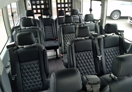 interior of ADA accessible vehicle with black seats