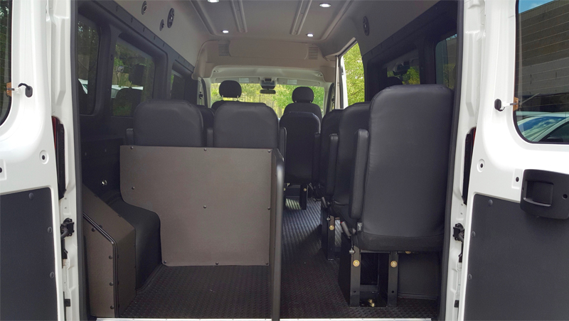 interior of white van with black seats