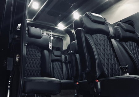 interior of black van with leather seats