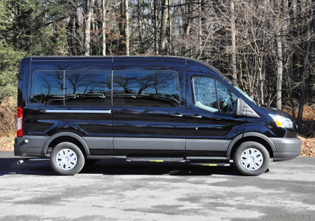 Black custom paratransit vehicle