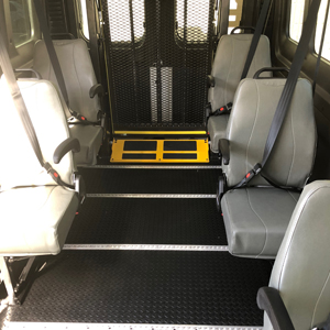interior of ADA-accesible van with white seats